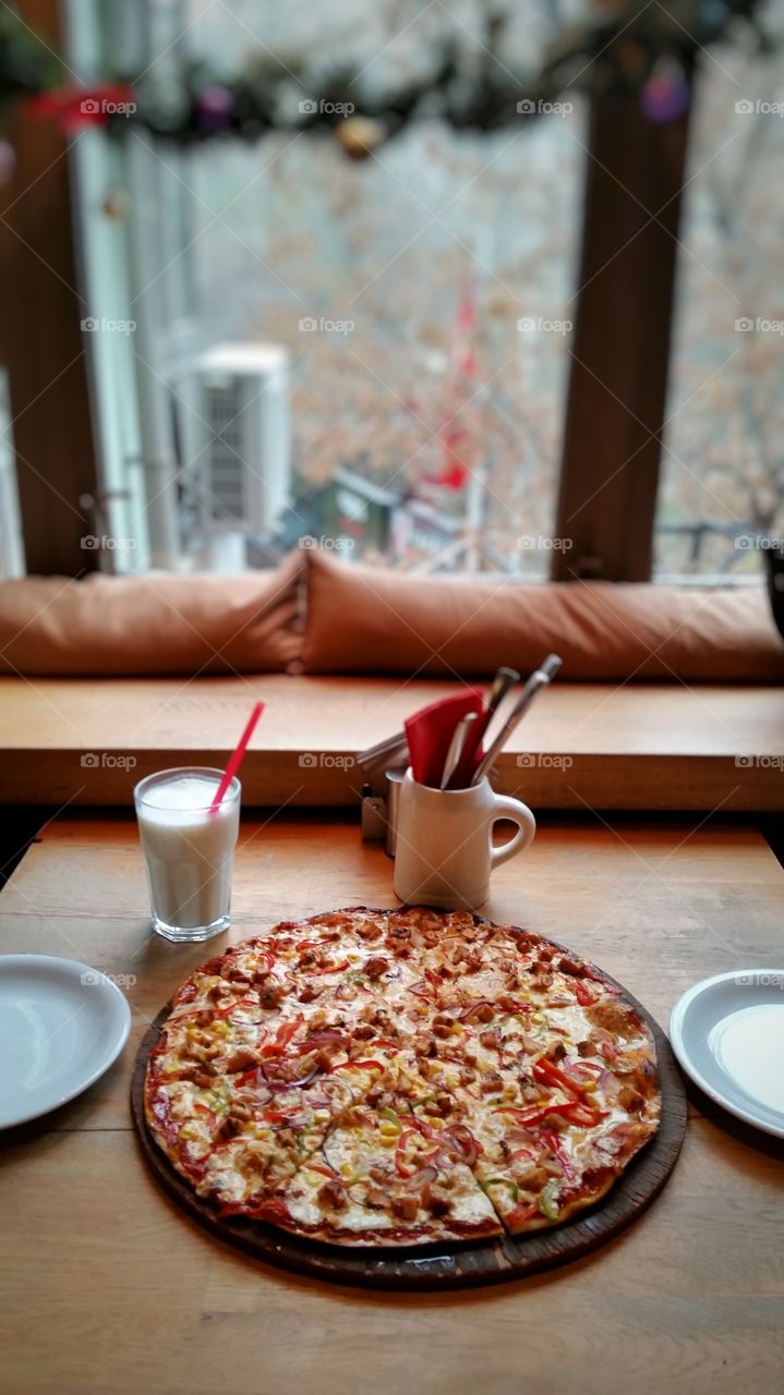 pizza served in a restaurant