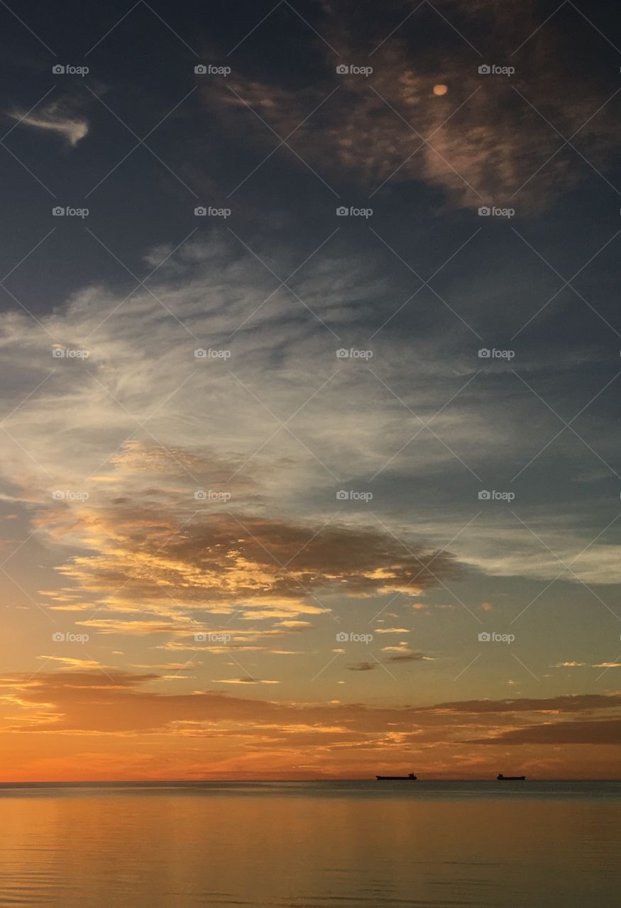 Sunrise in a beautifully wispy cloudy sky on the approach of a storm 