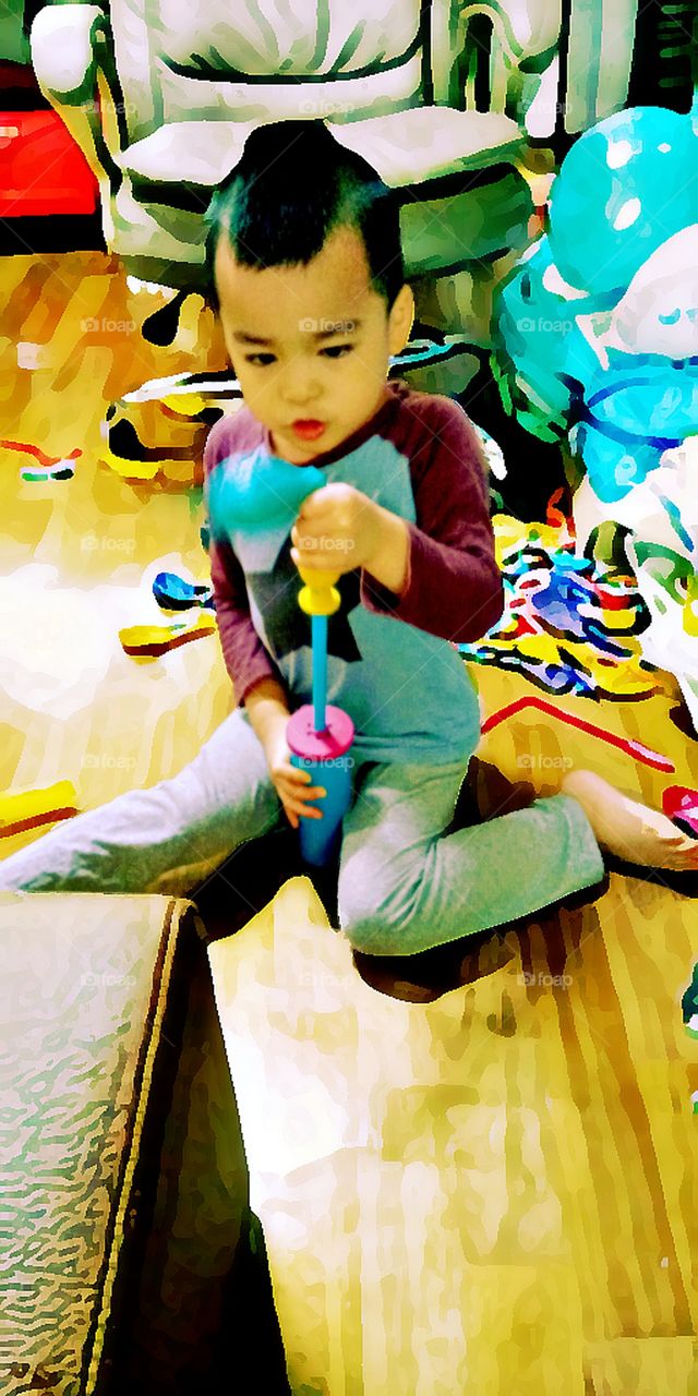 Pumping an air to the balloons.