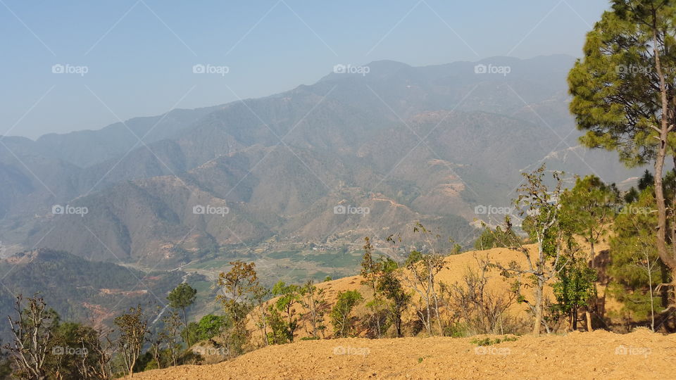 life in the hilly region of Nepal . How life moves? We are unable even to see how people lives in this type of mountain range locations in Nepal near Kathmandu, this awesome scenery describe you all about it's life. A very beautiful place but poor people there due to politics of Nepal.