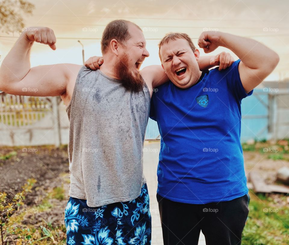 Two funny mans  outdoors portrait 