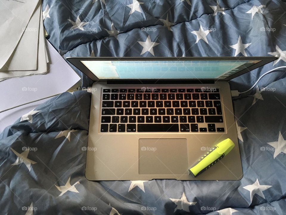 Home office with Laptop on the bed