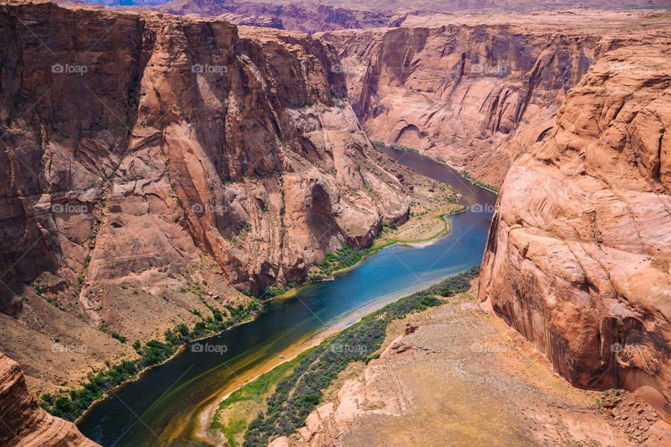 Colorado River running down Horseshoe Bend in Page, Arizona Navajo Nation
