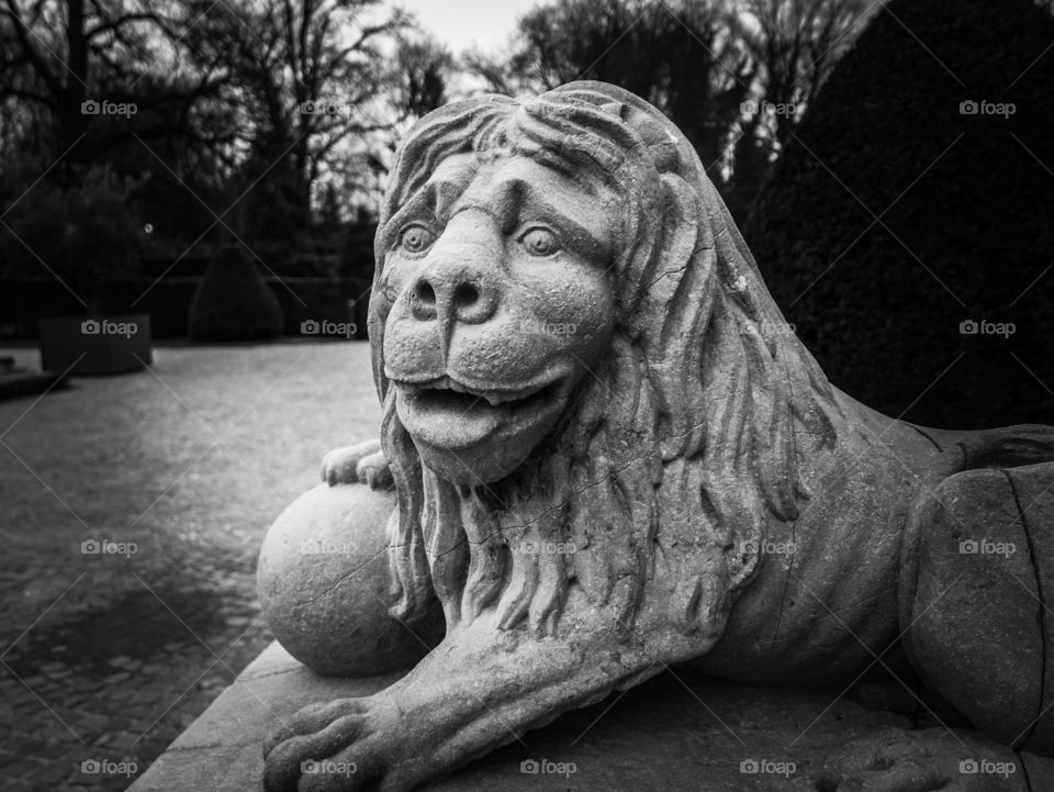 Sculpture of a lion in a park in Antwerp, Belgium.