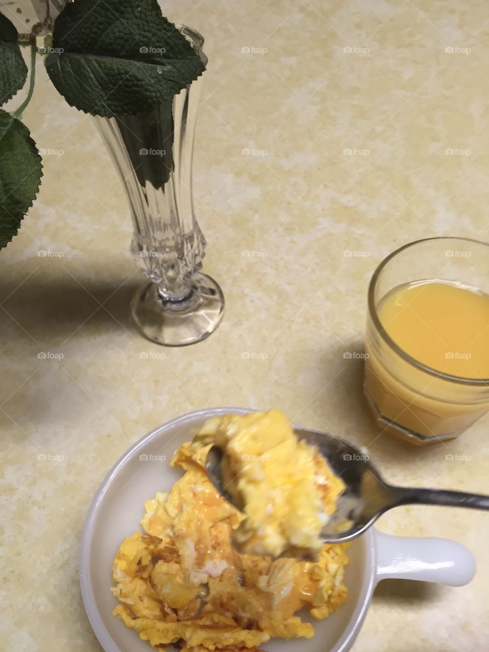 Morning ritual scrambled eggs and orange juice