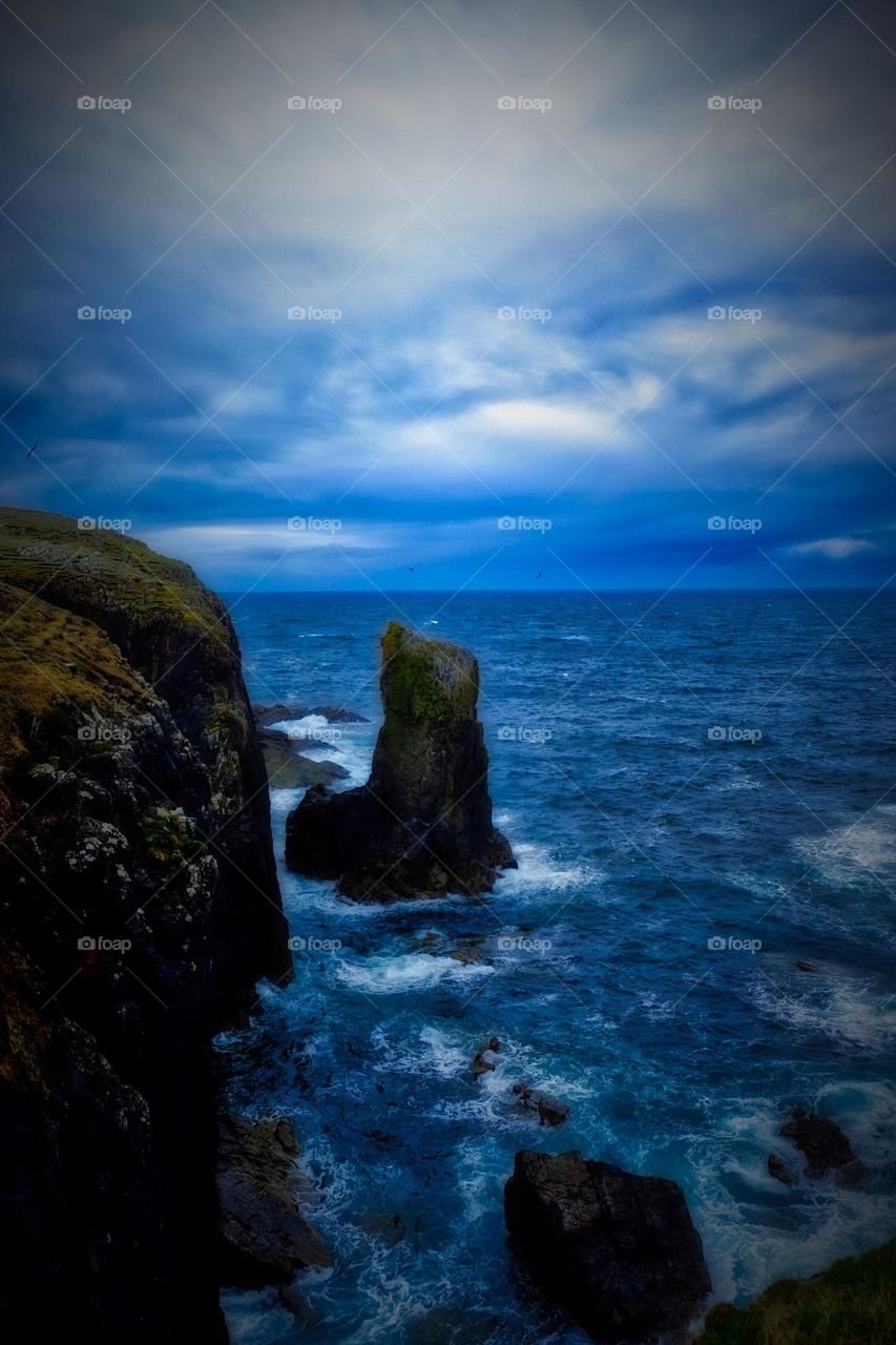 Standing on the edge of cliffs, Scotland cliffs, the waters edge, looking out into the ocean, dreaming of Scotland, the waters of Scotland 