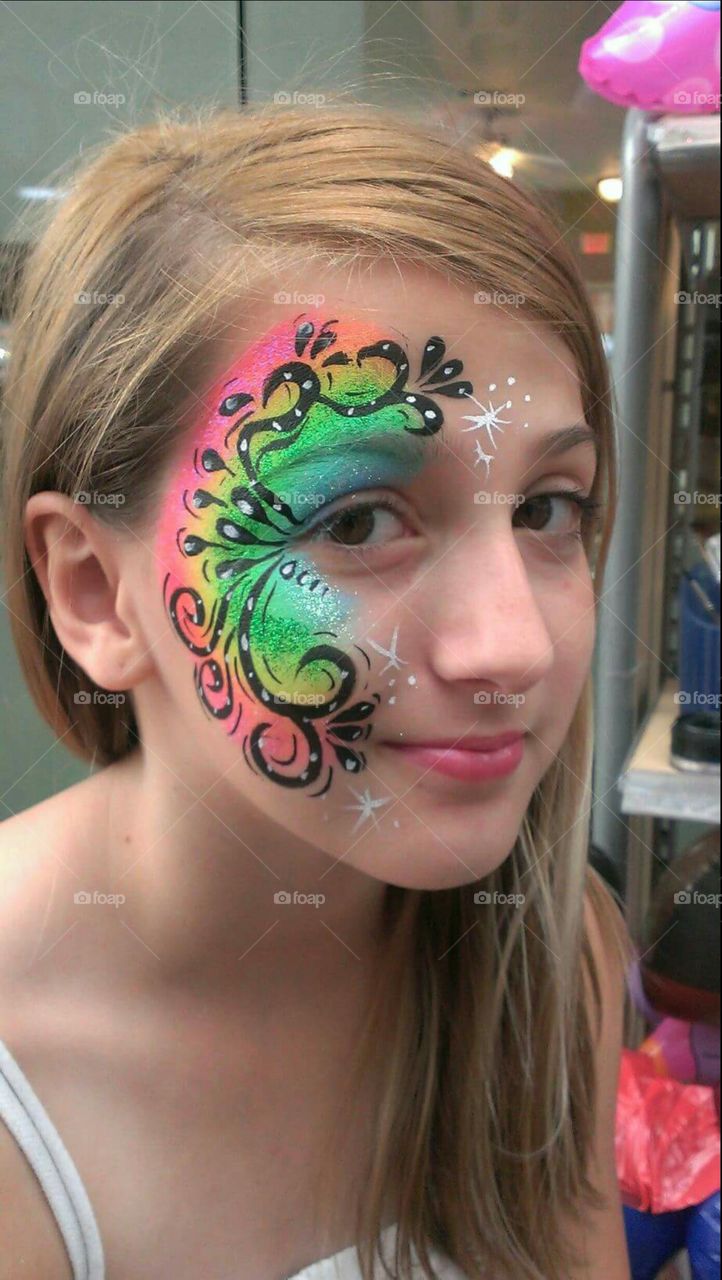 Close-up of girl with face paint