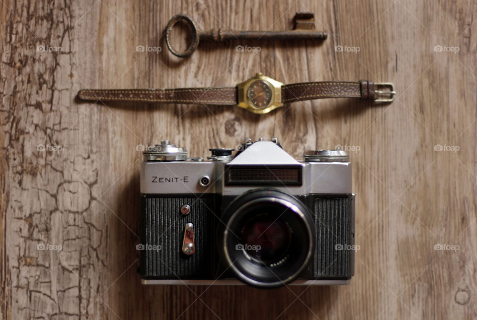 Vintage objects: camera, watch, key