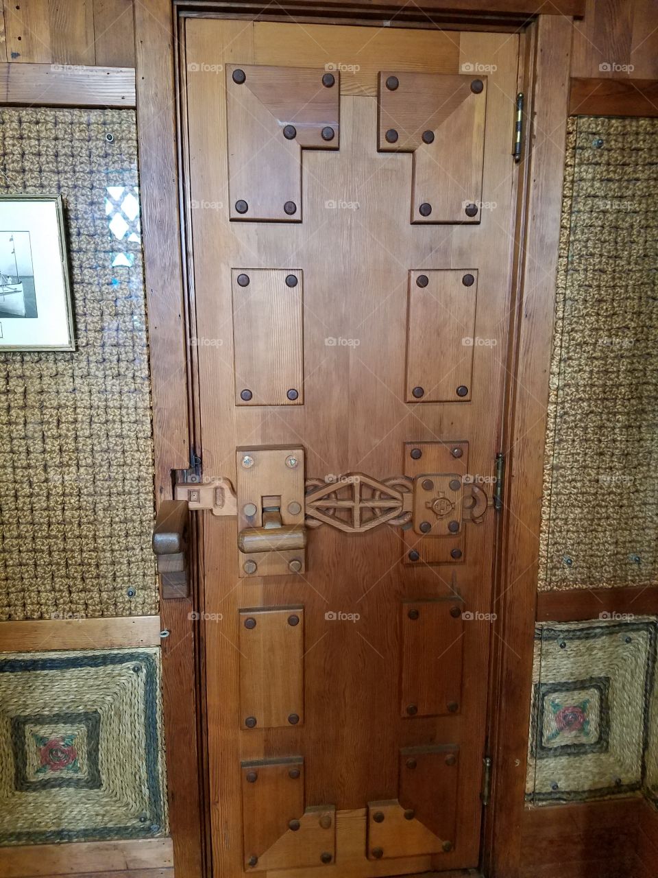 Unique latch on wooden door