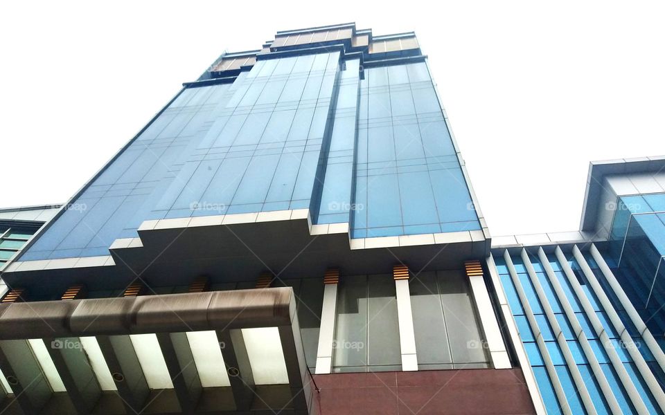 A tall building with a modern architectural design