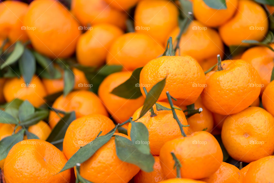 Delicious tangerines in the basket