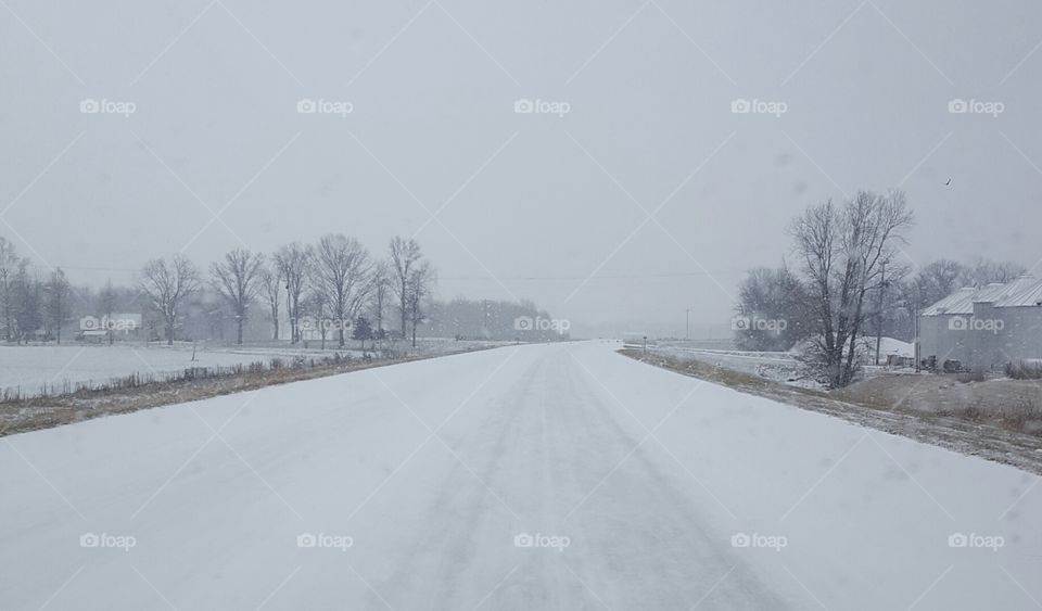 snow covered rural road