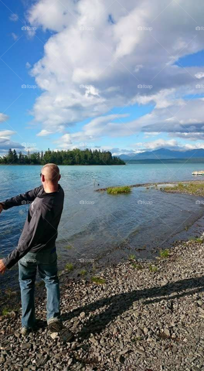 Skipping stones on Skilak Lake, Alaska.