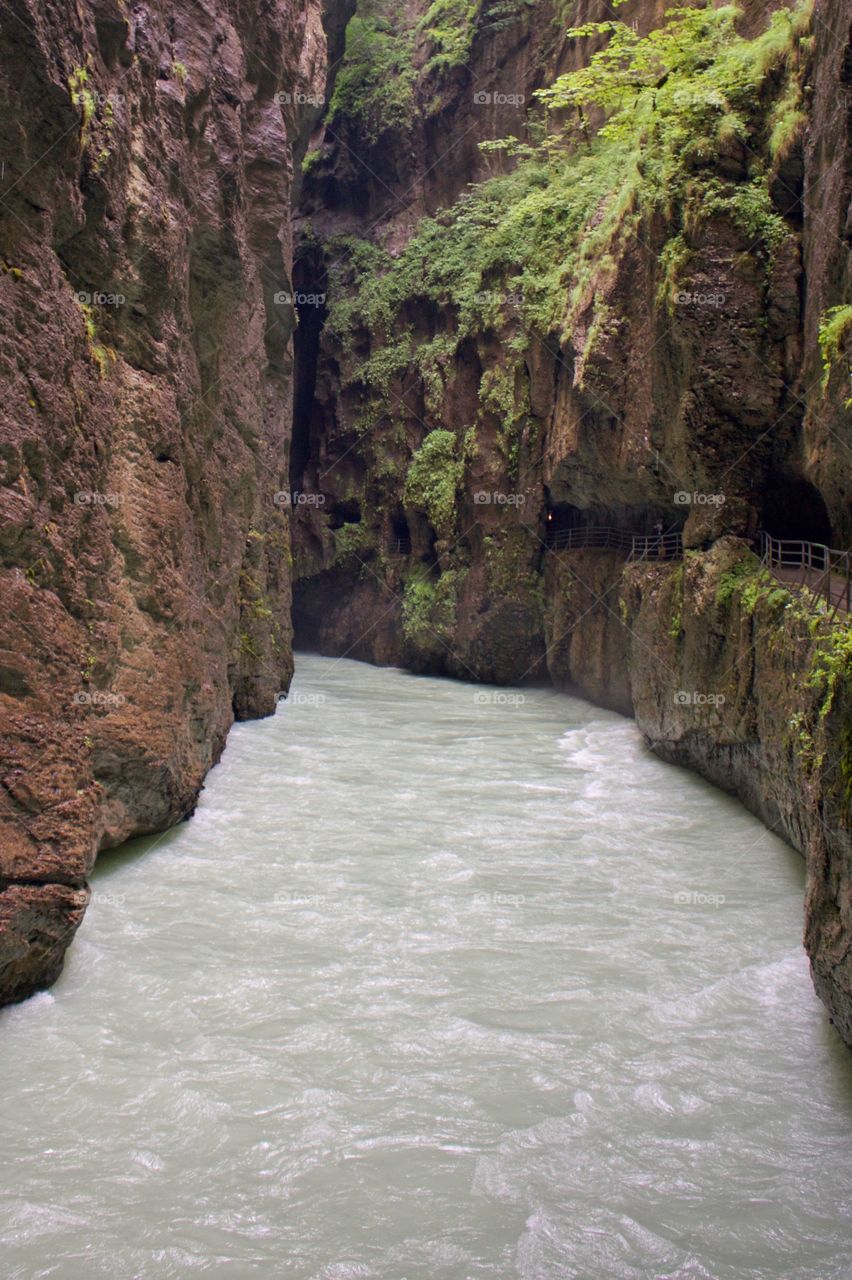 Water flowing between cliff