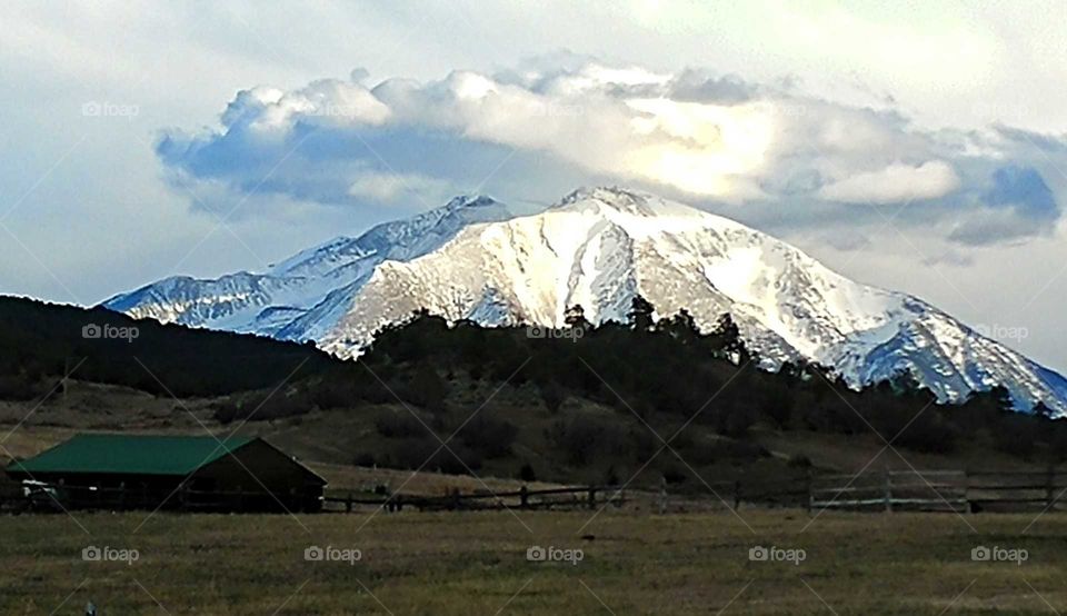 Fresh snow adorns the slopes of Mt Sopris in the evening light.