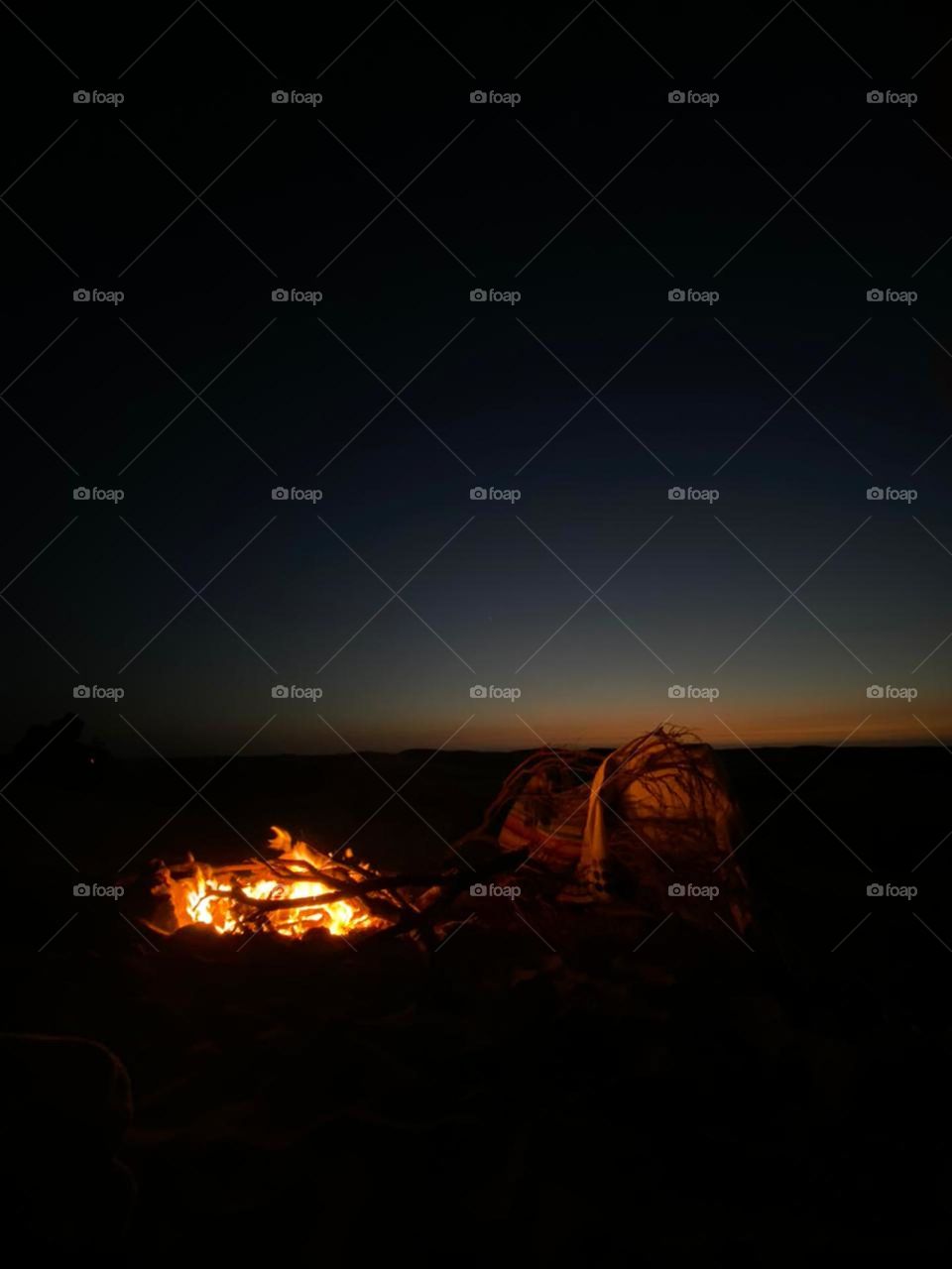 Beautiful fire near the beach at night at essaouira city in Morocco.