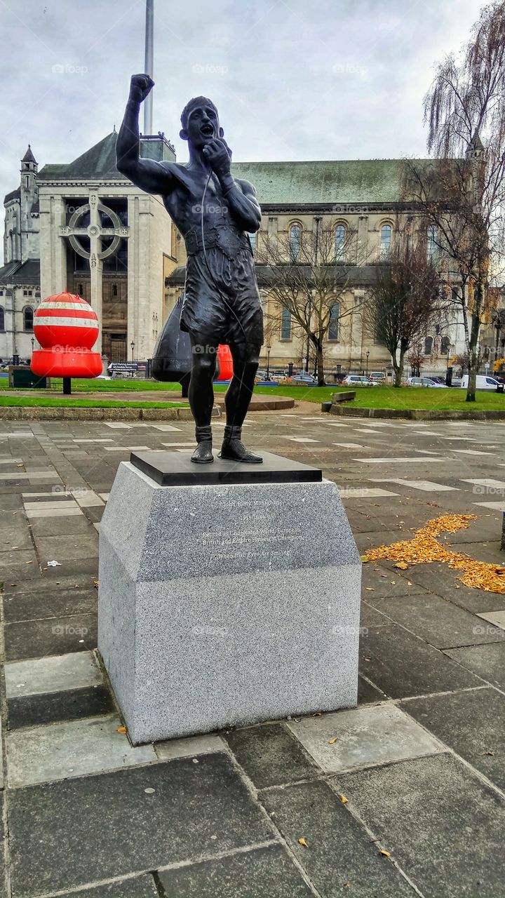 An irish boxer statue in front of St Anne's Cathedral in Belfast,Northern Ireland