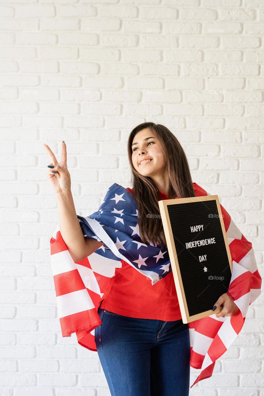 woman holding USA flag