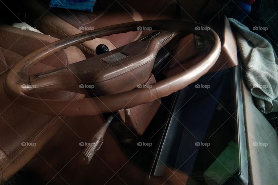 closeup of an old steering wheel