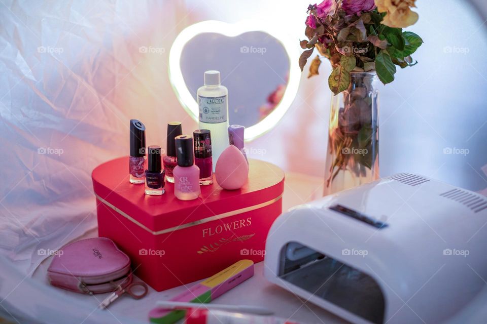 Manicure accessories: UV lamp, nail polishes, nail accessories...