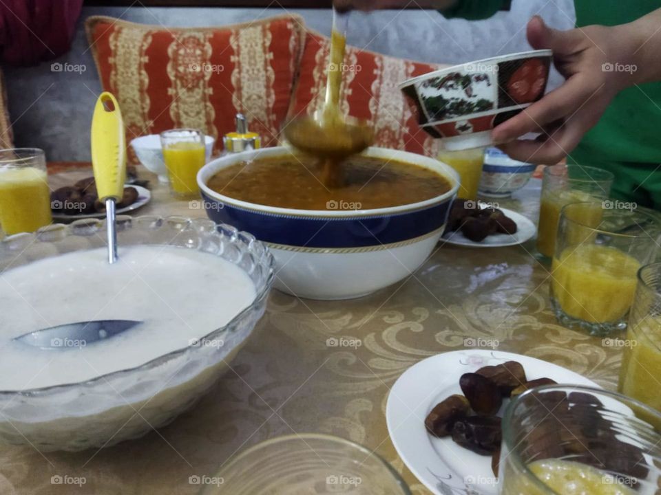 Moroccan table in Ramadan month:  Soup. Date and eggs.