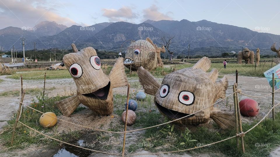 Straw fish statue in the park
