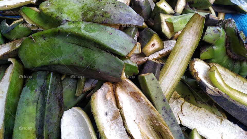 pile of green banana peels