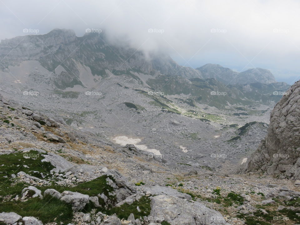 Mountain peaks embedded in clouds