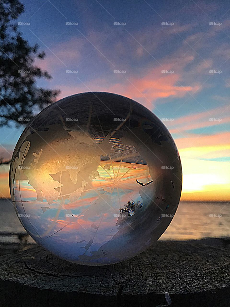 Sunset Extravaganza - sunset through the crystal ball, a refraction of light