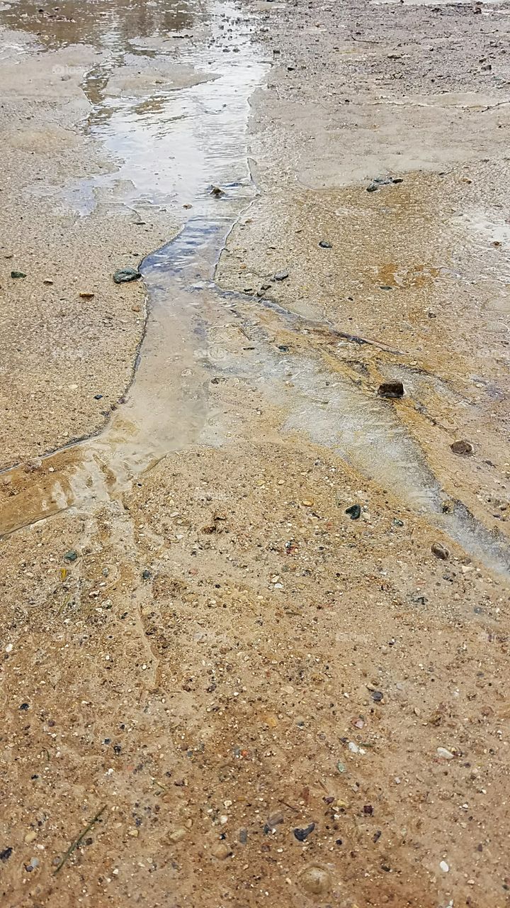 melting snow water running in Michigan