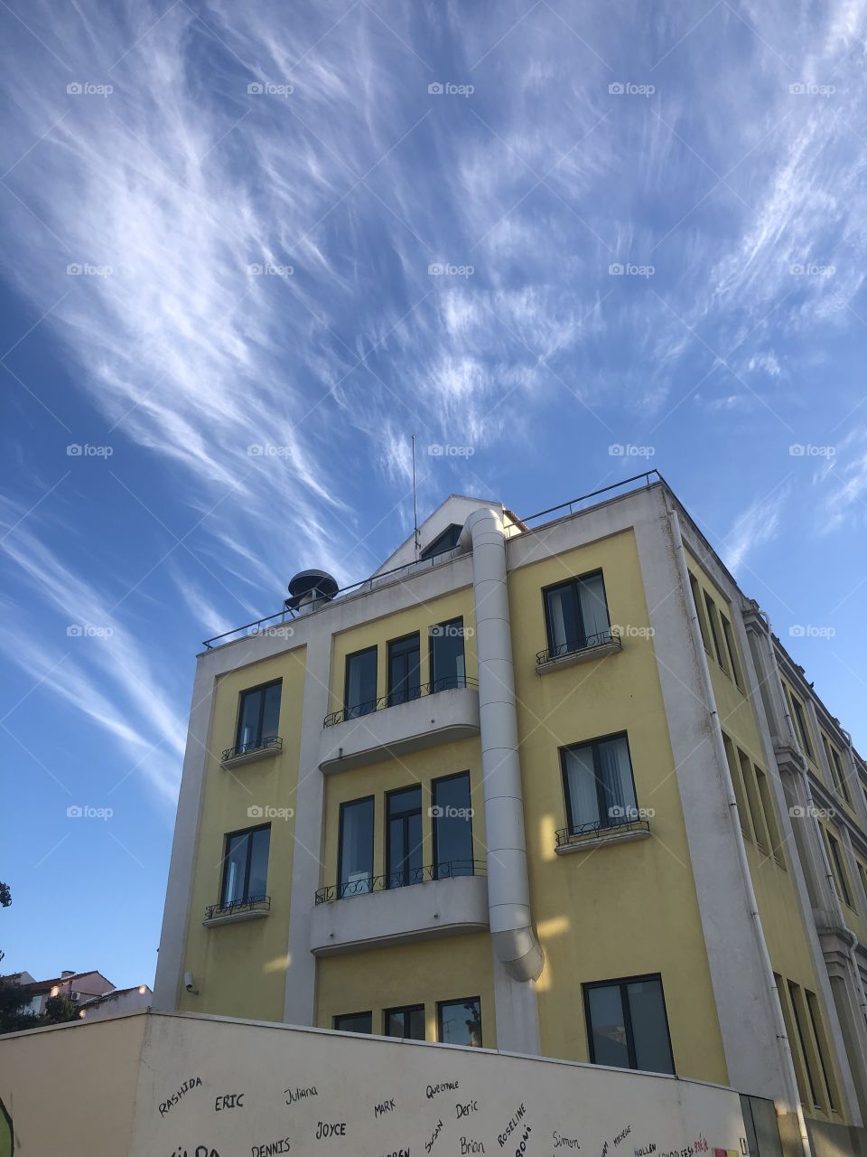 Blue sky and yellow building