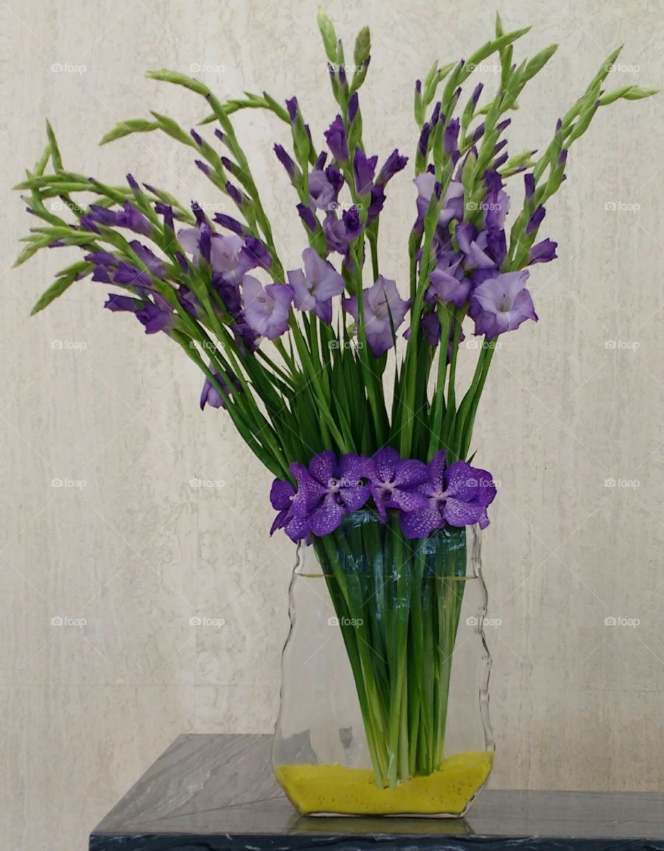 Main Flower in this Arrangement is Purple or a Lilac Color