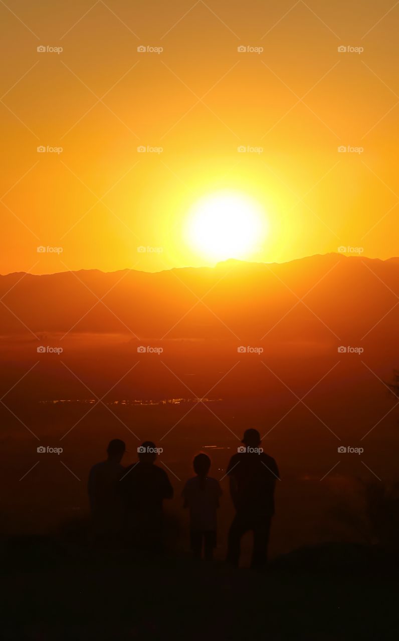 People watching sunset