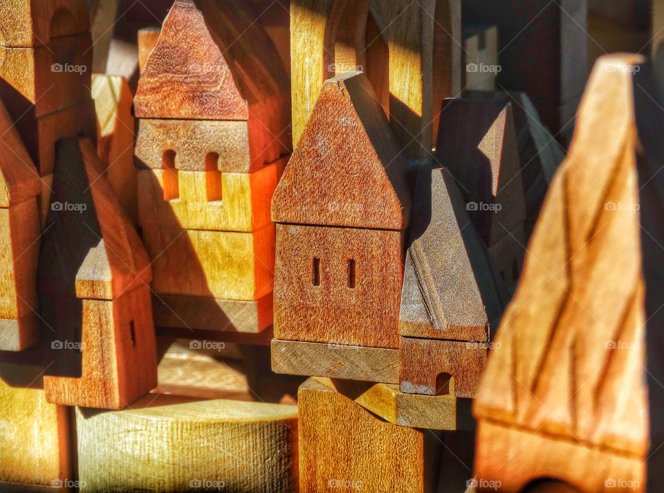 Wood Building Blocks. Childhood Toy Blocks In Golden Hour Sunlight
