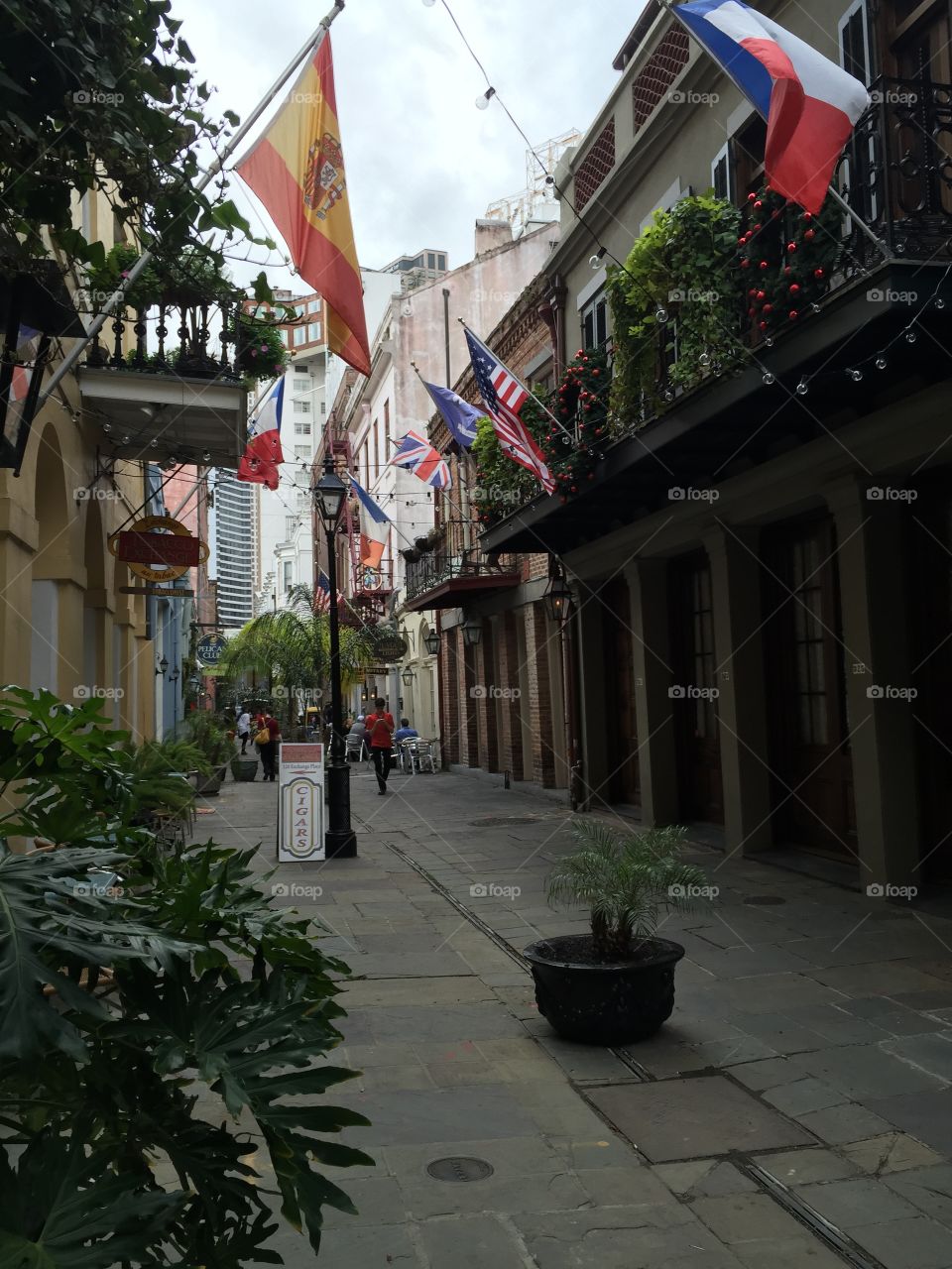 Flags waving in a sweet little New Orleans alleyway 
