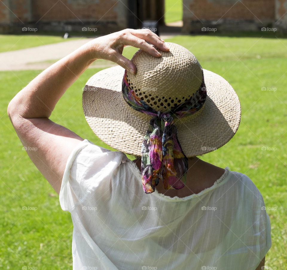 Woman. Straw hat