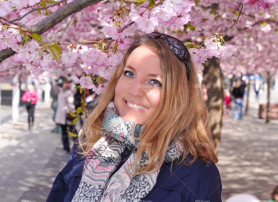 Portrait of a happy woman in park