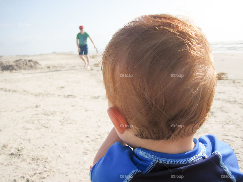 Watching dad at the beach