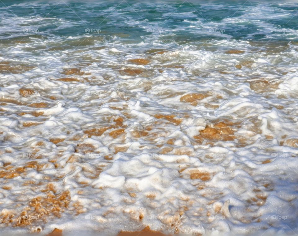 Full frame of surf at sea