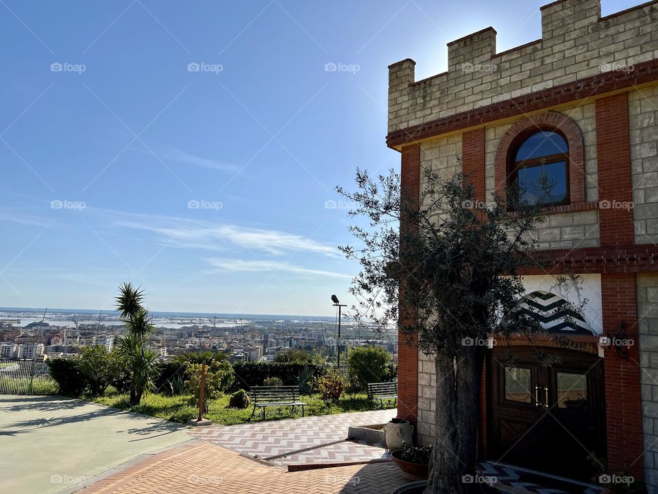 Part of a castle with view of the city 