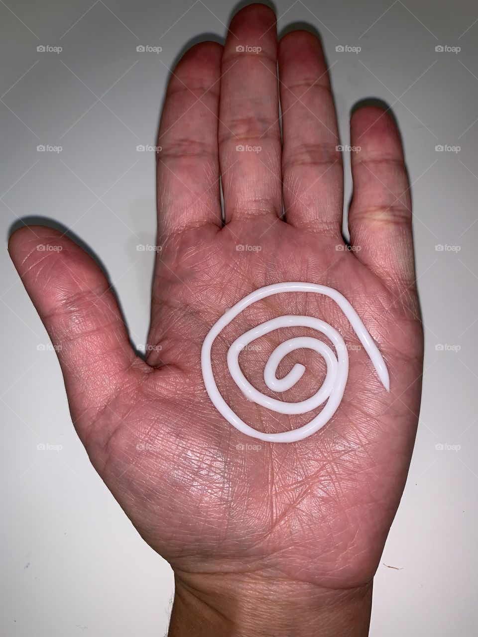 Moisturizing cream and lotion on my hand