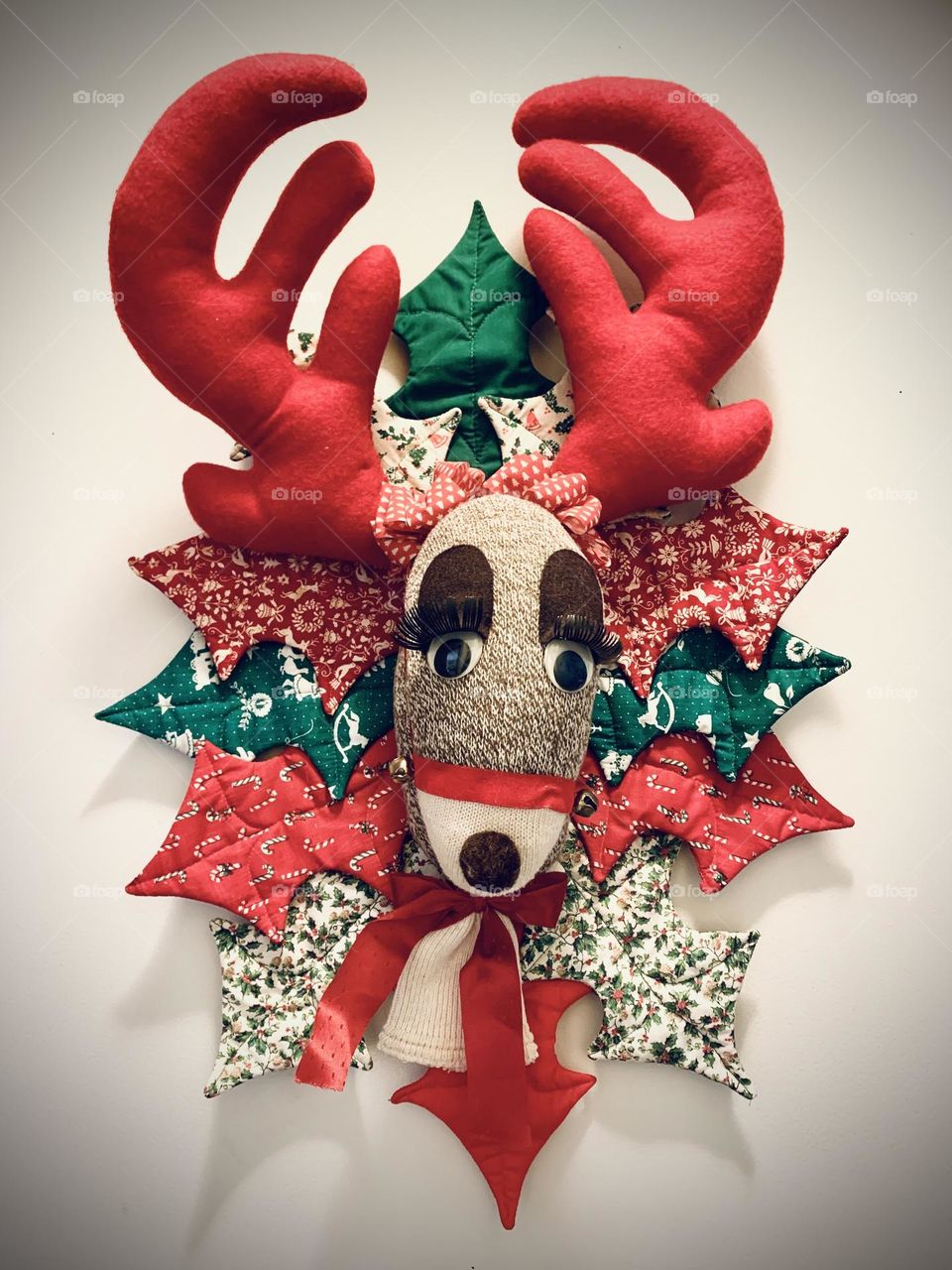 A reindeer head made out of socks and fabric. A great DIY project for the holidays! 