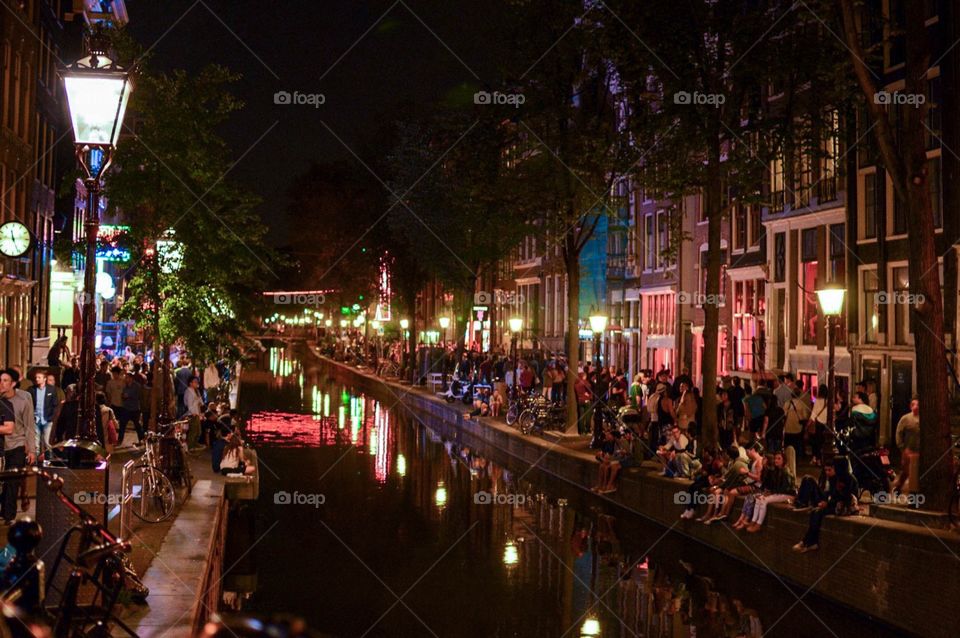 Amsterdam streets and canal at night
