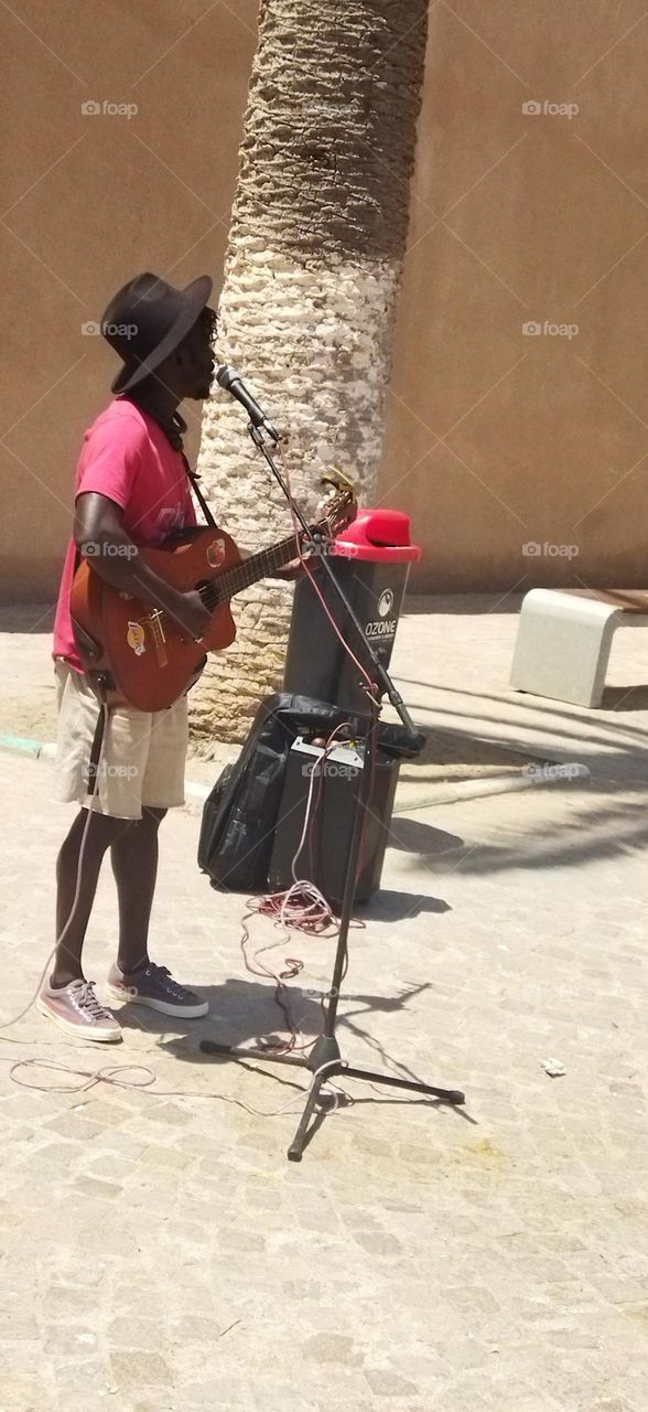 group of musician on street at essaouira city in Morocco.