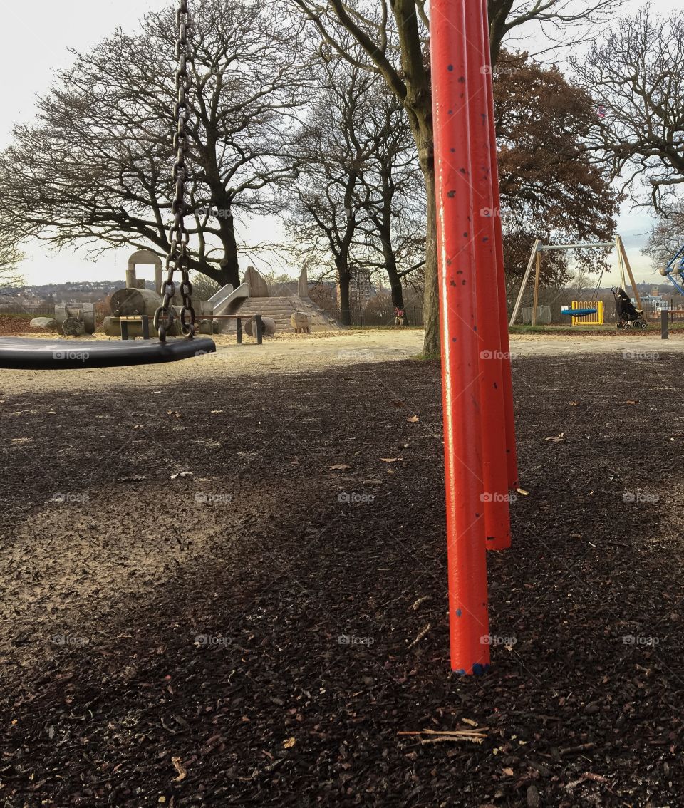 Red Swing on playground