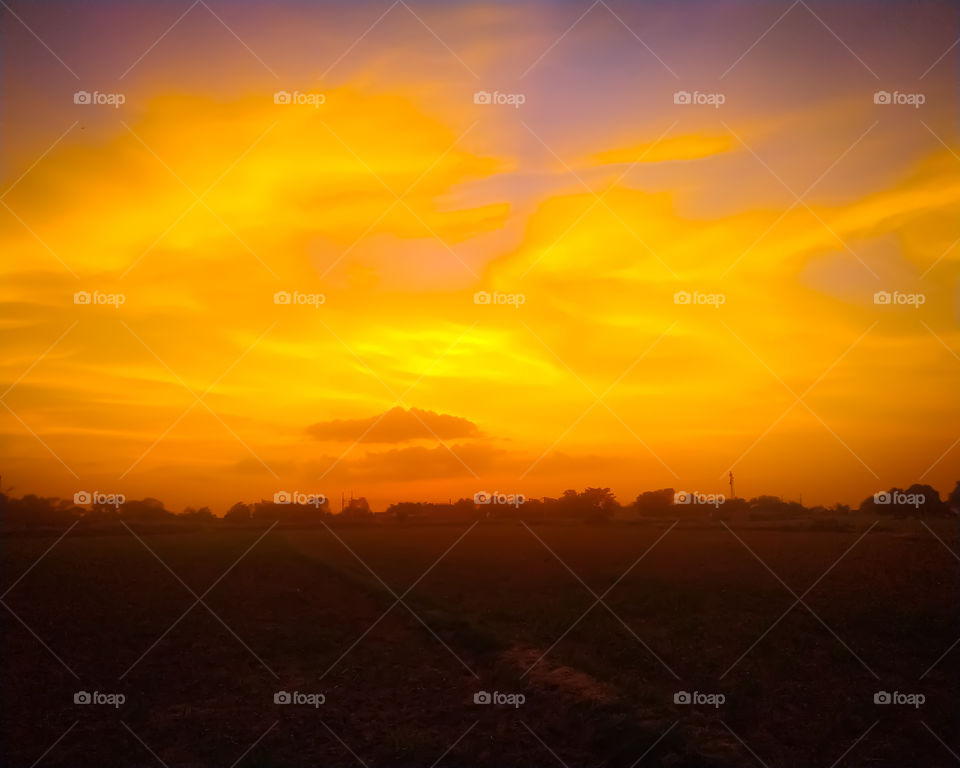 Sunset orange lake Field reflection landscape. Sunset Field reflection. Field sunset orange view.