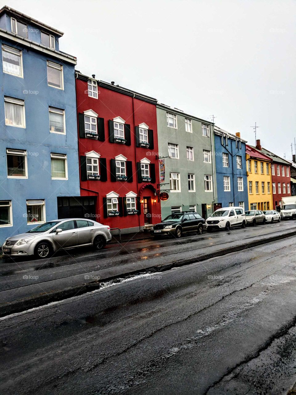 Colorful Row Of Houses On A Rainy Day