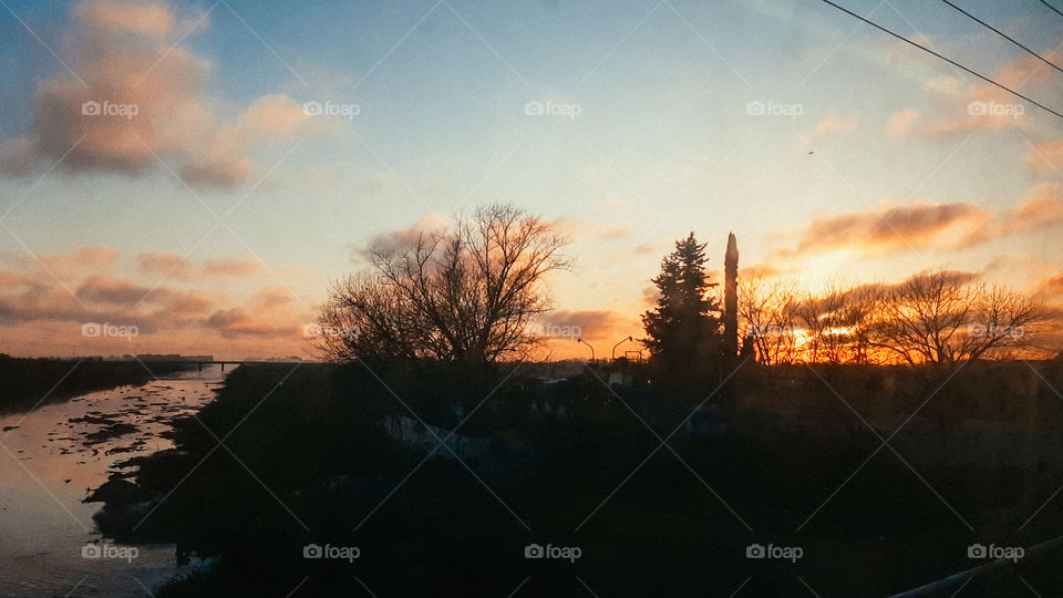 beautiful sunrise in the field stream