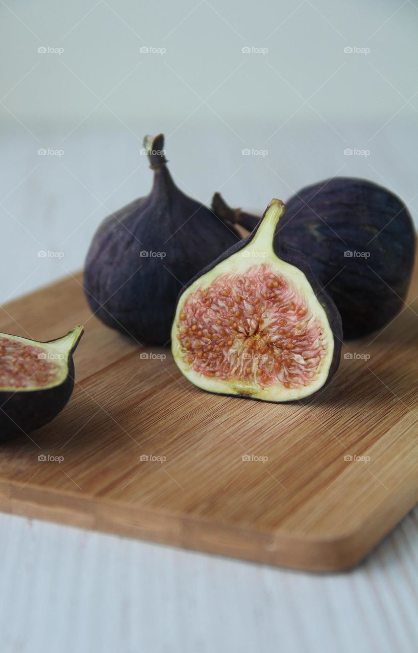 Figs on a wooden board