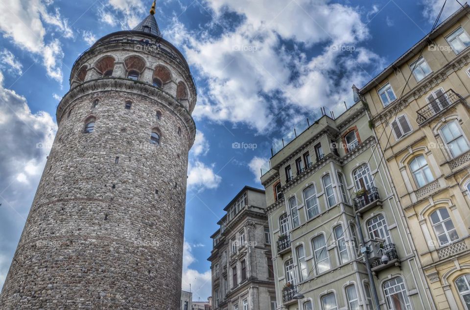 Galata tower between houses, Istanbul, Turkey